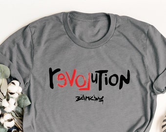 rEVOLition by BANKSY,Revolution Tee Shirt,Love Shirt,Love Tee,Anti War,Anti War Shirt,Banksy Shirt,Banksy Tee,Banksy,Art Shirt