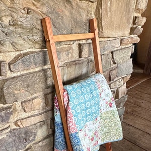Baby blanket rack sale