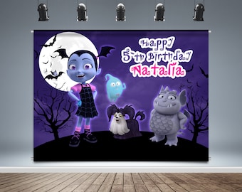 May include: A purple backdrop with a moon, bats, and trees.  The main image is a cartoon vampire girl with a pink and black dress, a ghost, a dog, and a gray monster. The text reads "Happy 5th Birthday Natalia".