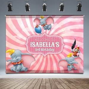 May include: Pink and white striped background with a pink banner that says "Welcome to Isabella's 3rd Birthday". There are three cartoon elephants on the banner, one flying and two standing.