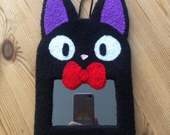 Espejo con aguja perforada hecho a mano con forma de gato repartidor negro