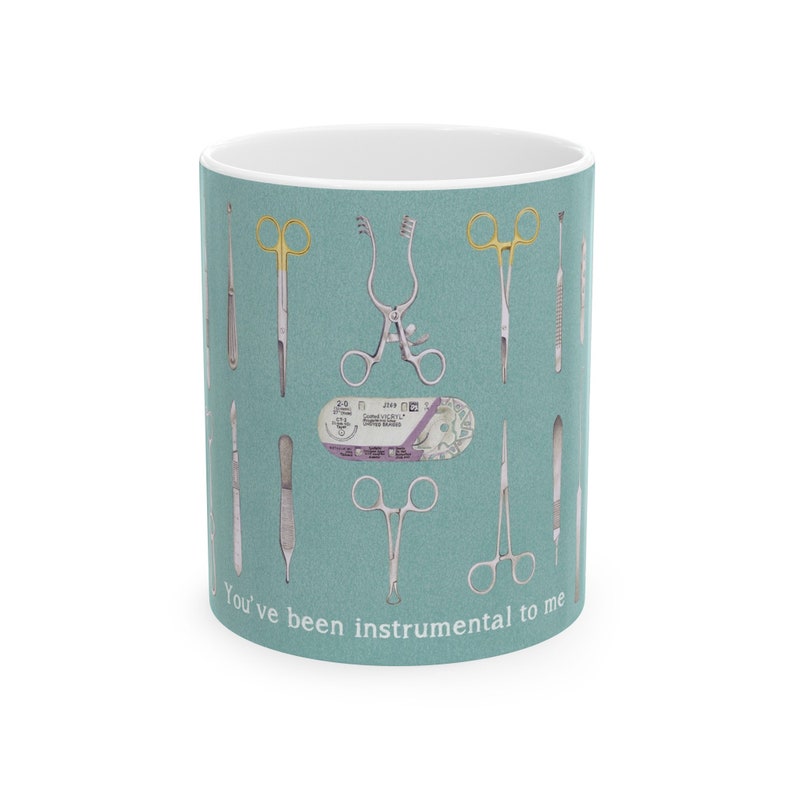 a coffe mug with patterns of surgical instruments on green background