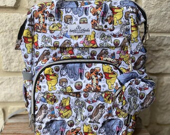 classic pooh diaper bolsa