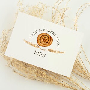 May include: A white card with a brown pastry illustration and the text "Cake & Bakery Shop Pies".