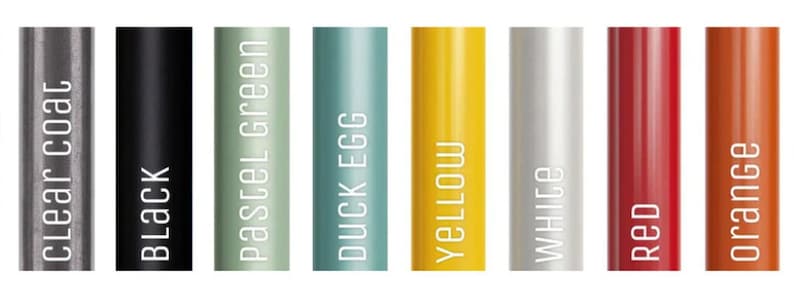 May include: A collection of cylindrical objects in various colors, including clear coat, black, pastel green, duck egg, yellow, white, red, and orange. Each cylinder has a label with its color name in white text.