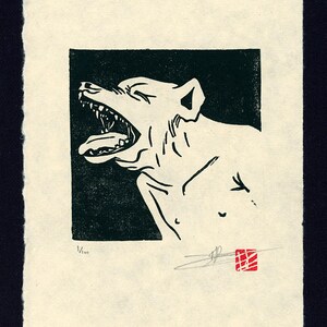 May include: Black and white woodcut print of a dog's head with its mouth open, showing teeth. The print is on a cream-colored paper with a red stamp in the lower right corner.