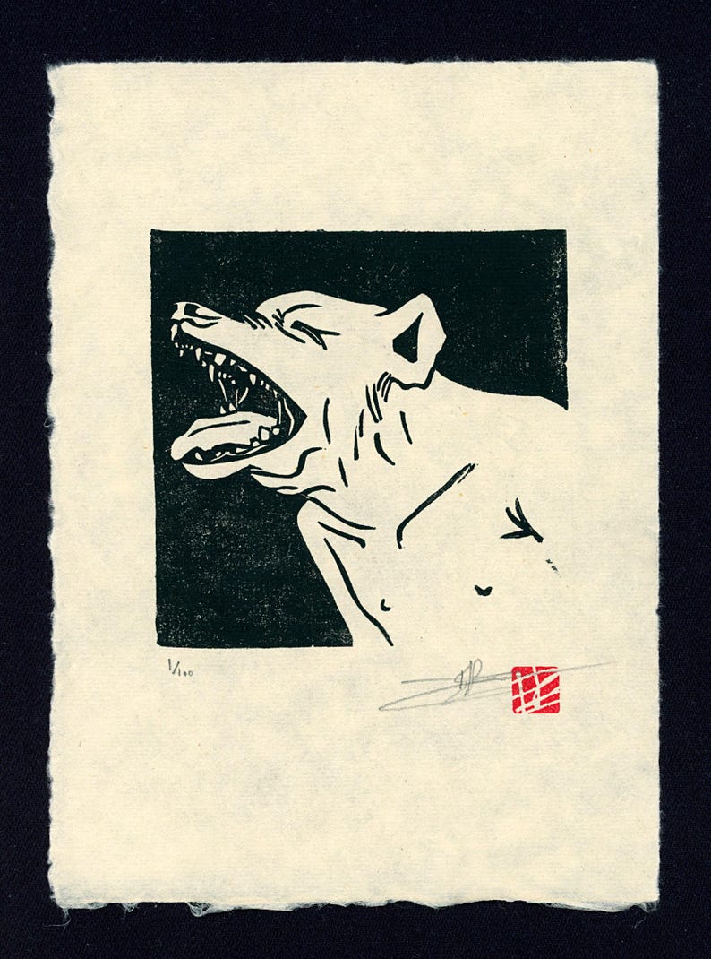 May include: Black and white woodcut print of a dog's head with its mouth open, showing teeth. The print is on a cream-colored paper with a red stamp in the lower right corner.