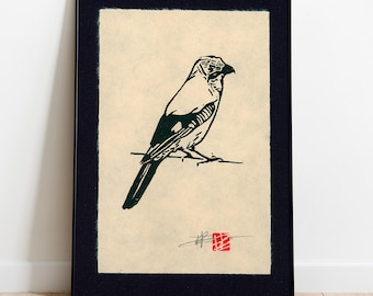 May include: Framed print of a black and white bird illustration, reminiscent of Japanese art. The bird is perched on a branch against a cream backdrop, framed in black. The artwork has a minimalist style. The print is in a black frame.