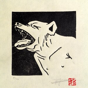 May include: Black and white woodcut print of a dog with its mouth open, showing its teeth. The dog is facing to the left and is set against a black background.