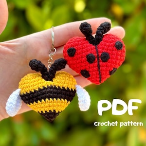 May include: Crochet pattern PDF for a ladybug and a bee, both in the shape of a heart. The ladybug is red with black spots and the bee is yellow with black stripes. Both have white wings.
