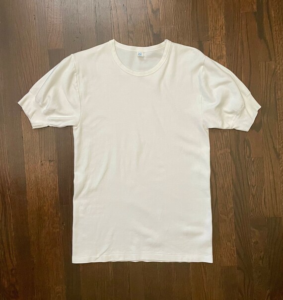 Vintage White T Shirt
 White vintage t shirt Gem