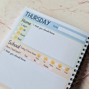 May include: A daily planner with a light blue and yellow cover. The planner has a section for "Home" and "School" with space to write about the day. The planner also has a section for "I think you should know" with space to write about things that happened during the day. The planner has a section for "Today I have been" with a row of emojis to choose from.