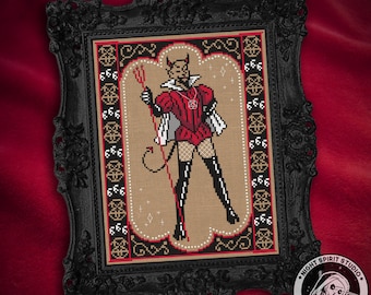 May include: A cross stitch pattern of a devil figure in a red and black costume, holding a trident. The figure is standing on a beige background with a black border. The pattern is framed in a black ornate frame.