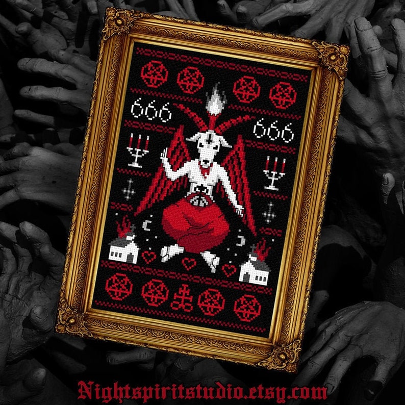 May include: A framed cross-stitch pattern featuring a red and black design of a goat-like figure with wings and horns, surrounded by pentagrams and the number 666. The figure is sitting on a throne with flames and houses in the background.