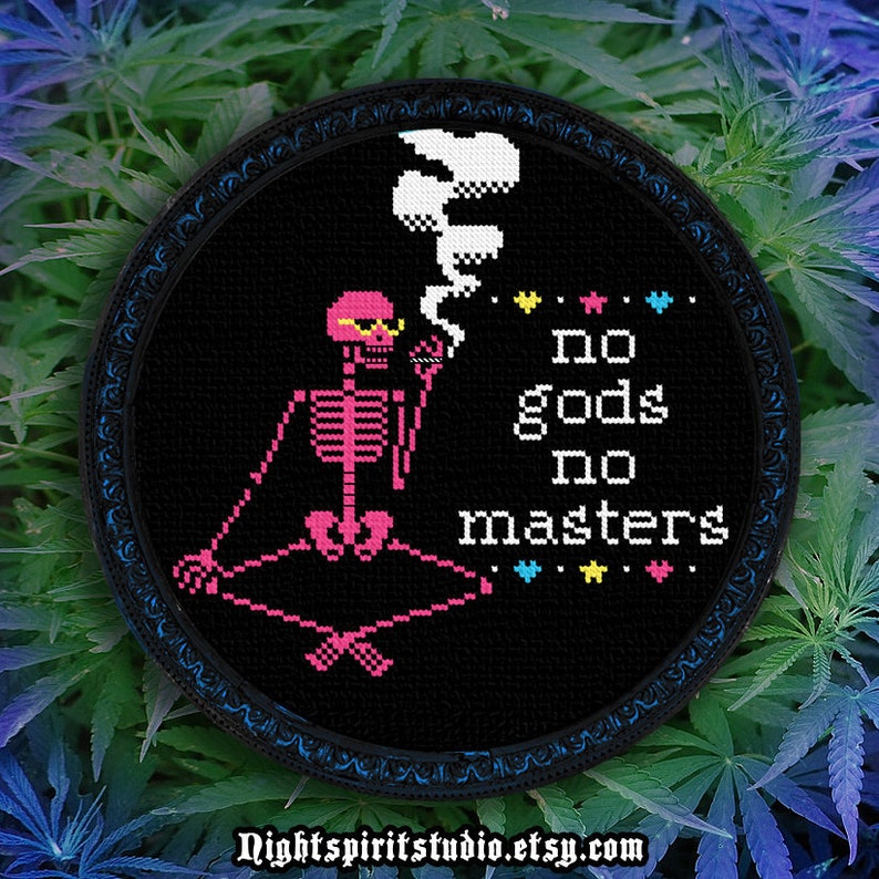 May include: A black and pink pixelated skeleton wearing sunglasses and smoking a joint, sitting in a meditative pose. The text "no gods no masters" is written in white on a black background. The image is surrounded by a black frame with a blue border.