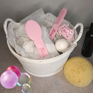Pink brush and comb set for babies from birth