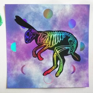 holographic rabbit print: skeleton and moon phases space foil print
