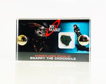 Red Dwarf Snappy the Crocodile Screen Used Piece mini display.