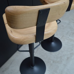 Close-up of backrest natural wood grain seat – comfortable kitchen barstool