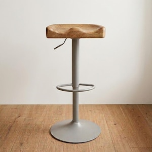 Side view of solid oak bar stool with metal base, height adjustable, handcrafted in Germany
