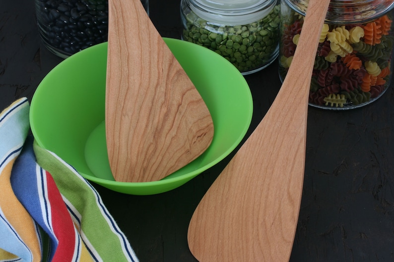 Wok spatula with a long handle available for chefs and cooks that are left or right handed Cherry wood cooking tool.