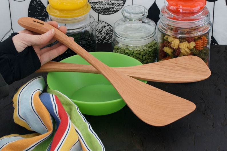 Wok spatula with a long handle available for chefs and cooks that are left or right handed Cherry wood cooking tool.