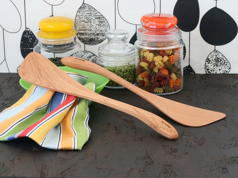 Wok spatula with a long handle available for chefs and cooks that are left or right handed Cherry wood cooking tool.