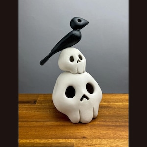 Handmade Porcelain Skull Stack Sculpture with Raven