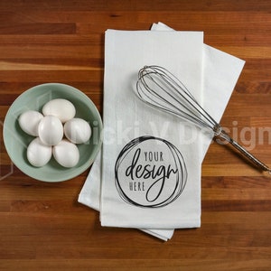 Flour Sack Towel Mockup with Bowl of Eggs & Whisk on Butcher Block
