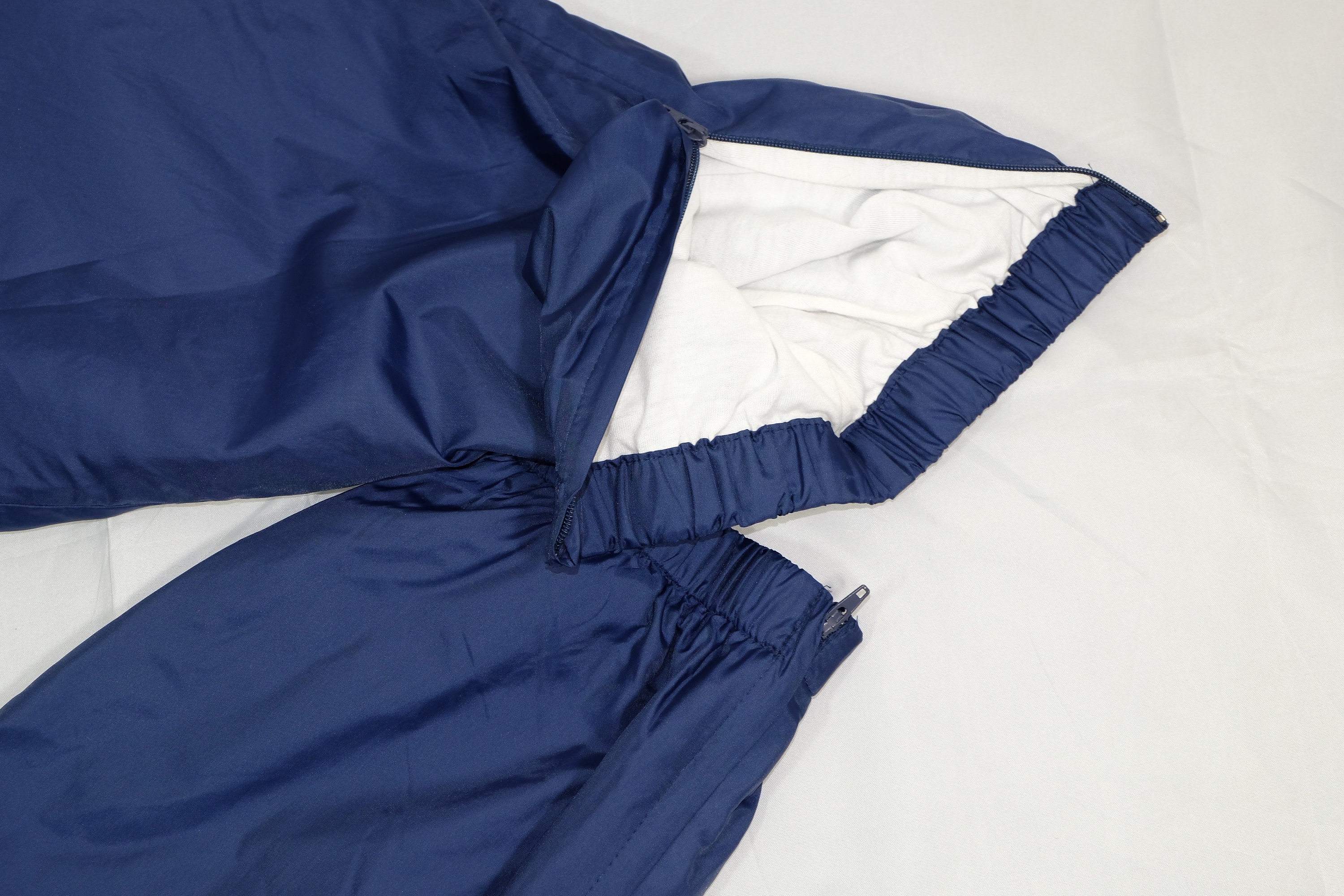 double swoosh track pants