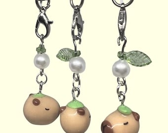 Capybara phone charm handmade clay capybara with leaf charm