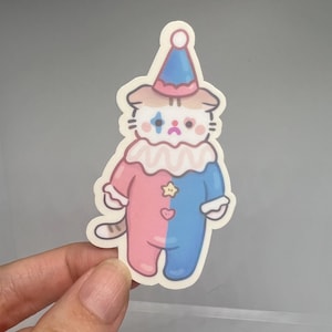 Cute clown cat in costume sticker