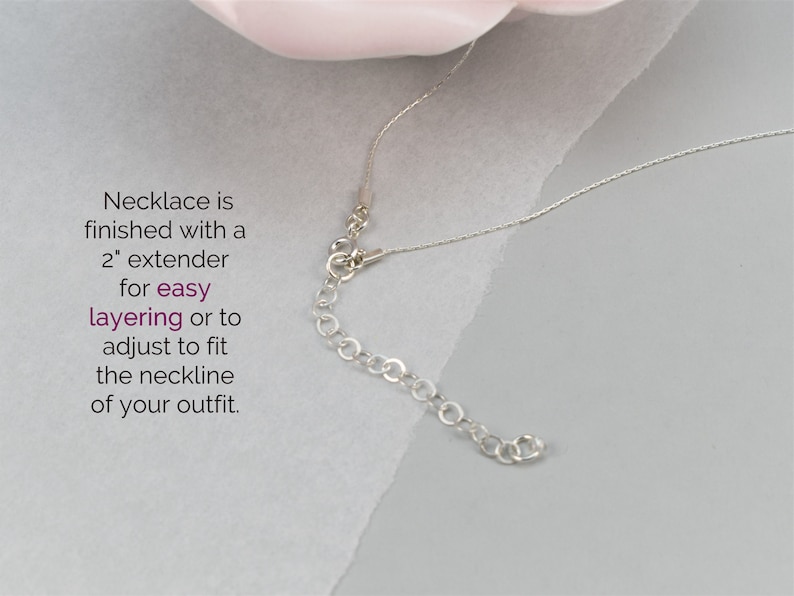 May include: Silver necklace with a 2 inch extender chain. Necklace is finished with a 2" extender for easy layering or to adjust to fit the neckline of your outfit.