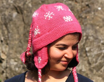 Pure wool hand knit winter trapper hat with snow flakes on it! High quality beanie. This Peruvian chullo is a great christmas gift for her!