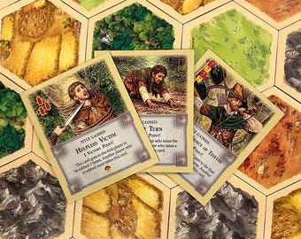 Carte Vittima, Ladro e Turno più lento compatibili con i pezzi di ricambio del gioco da tavolo I coloni di Catan e le espansioni di Catan.