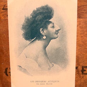 Late 19th century postcard from microcephalic circus sideshow performer Bartola. ODDITIES