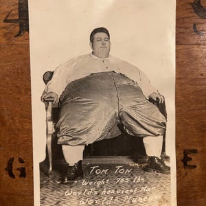 Circa 1920 postcard of sideshow performer Tom Ton, age 29, weight 745 pounds. ODDITIES