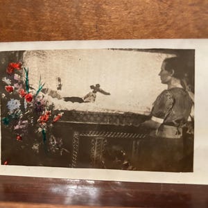 Early 1900s post mortem photo with hand colored flowers. ODDITIES