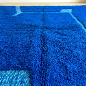 Blue Berber wool rug texture showing thick plush handmade fibers
