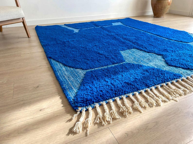Handmade Moroccan rug detail with soft wool texture and tribal lines
