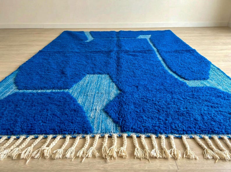 Blue Moroccan wool rug with abstract Berber design and thick handmade pile