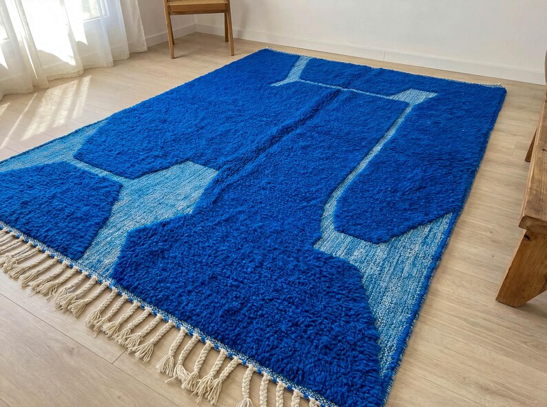 Side angle of abstract Beni Ourain rug showing thick wool pile