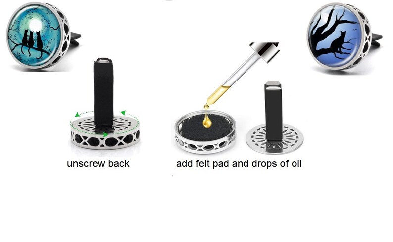 May include: Instructions for using a car air freshener. Unscrew the back of the diffuser, add a felt pad and drops of essential oil, then screw the back on. The diffuser features a silver metal base and a glass top with a design of three cats sitting on a branch under a moon.