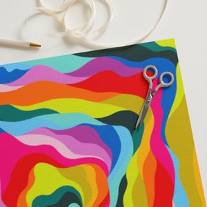 May include: Abstract colourful wrapping paper with a swirling pattern of red, orange, yellow, green, blue, purple and pink.