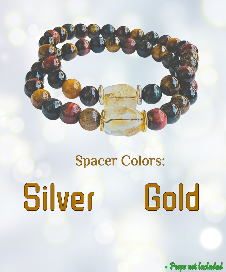 K&ouml;nnte beinhalten: Zwei &uuml;bereinanderliegende Armb&auml;nder mit Tigerauge, rotem Jaspis und schwarzen Onyx-Perlen. Die Armb&auml;nder haben klare Quarz-Abstandshalter mit silbernen oder goldenen Akzenten. Farben der Abstandshalter: Silber Gold