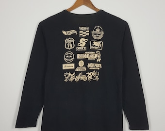 T-shirt vintage studio d'artisan logo design a manica lunga