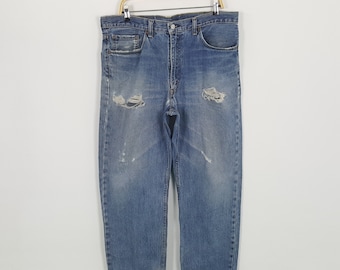 Vintage LEVI'S 501 American Kurt Cobain Distressed Jeans