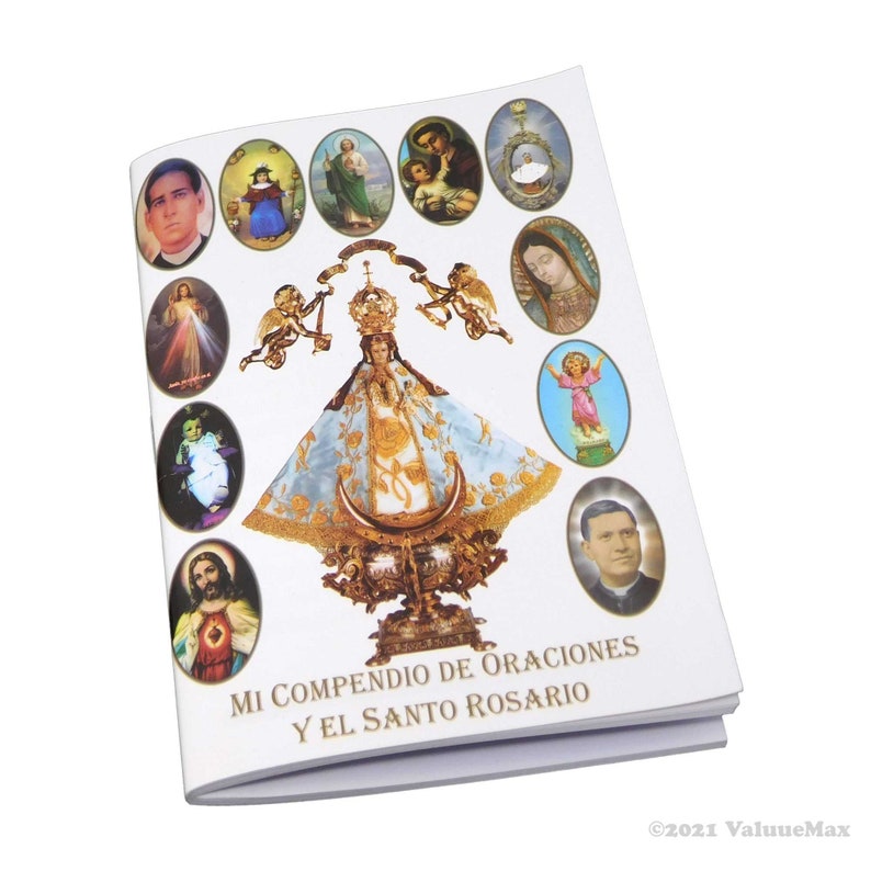 May include: A white booklet with a colorful image of the Virgin Mary on the front cover. The title of the book is "Mi Compendio de Oraciones y El Santo Rosario".