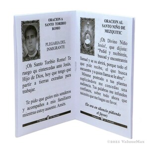 May include: A small, white booklet with a black and white image of a man on the left side and a black and white image of a child on the right side. The text on the left side reads "Oracion a Santo Toribio Romo" and the text on the right side reads "Oracion al Santo Nino de Mezquitic".