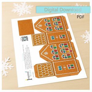 May include: A printed PDF featuring gingerbread house cutouts. The brown paper has white icing details and colourful stained-glass windows. The words "Digital Download" and "PDF" are visible. The design is by "Inspired by Life".